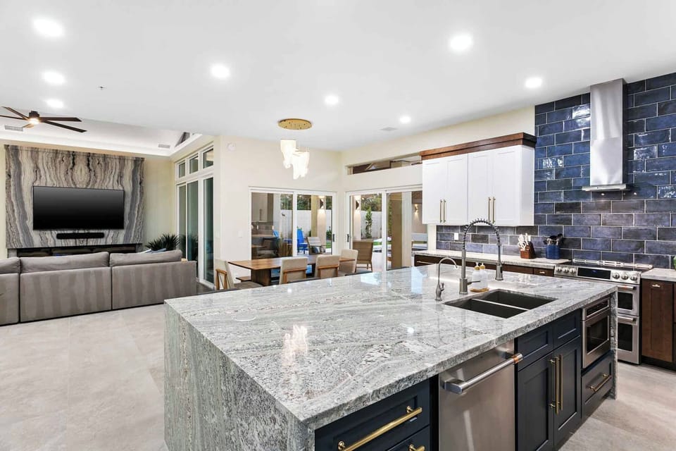 Gourmet kitchen fully-stocked with stainless steel appliances