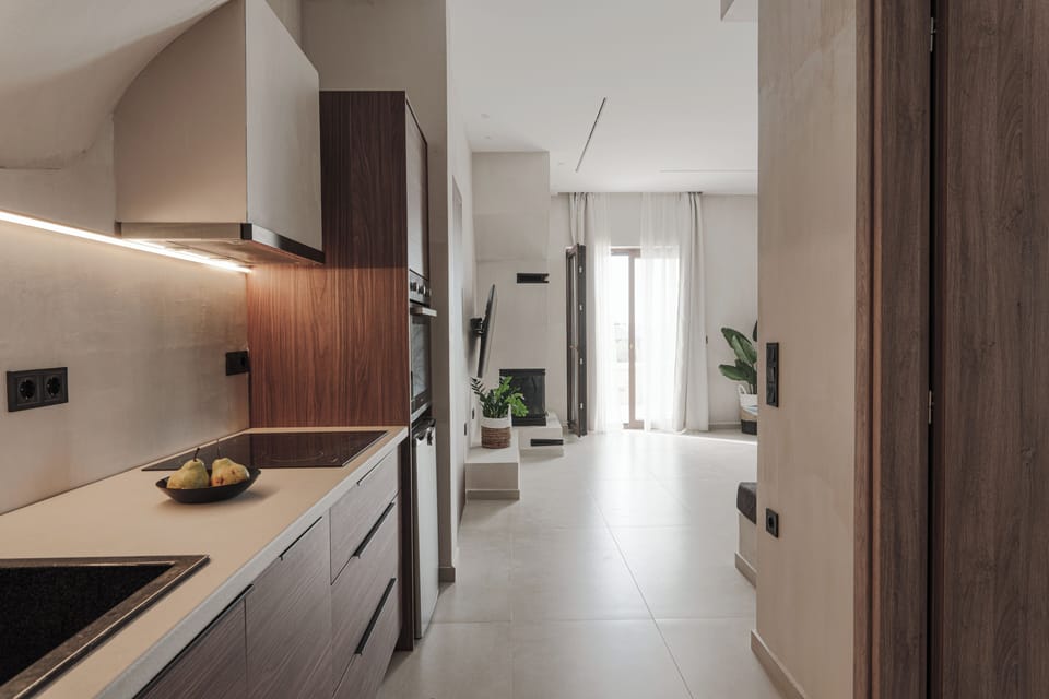 The fully equipped kitchen of the first apartment 