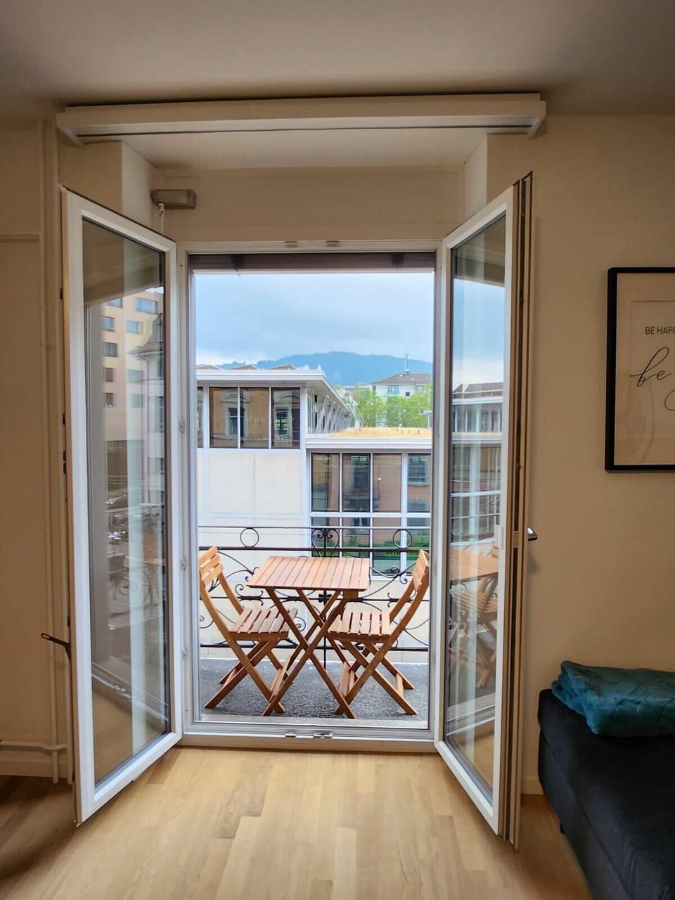 Cozy and sunny balcony. 
Building opposite is only a tram depot station and hence living room has privacy.