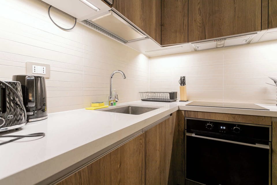 Sleek and modern kitchen with all essentials for a comfortable stay in the heart of Chile.