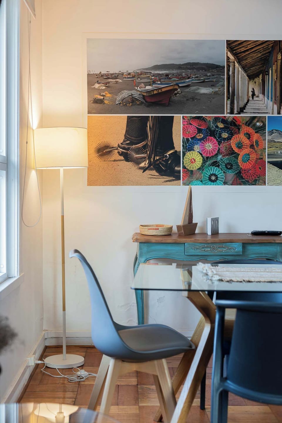 Chic dining area with modern decor and vibrant wall art, perfect for intimate meals.