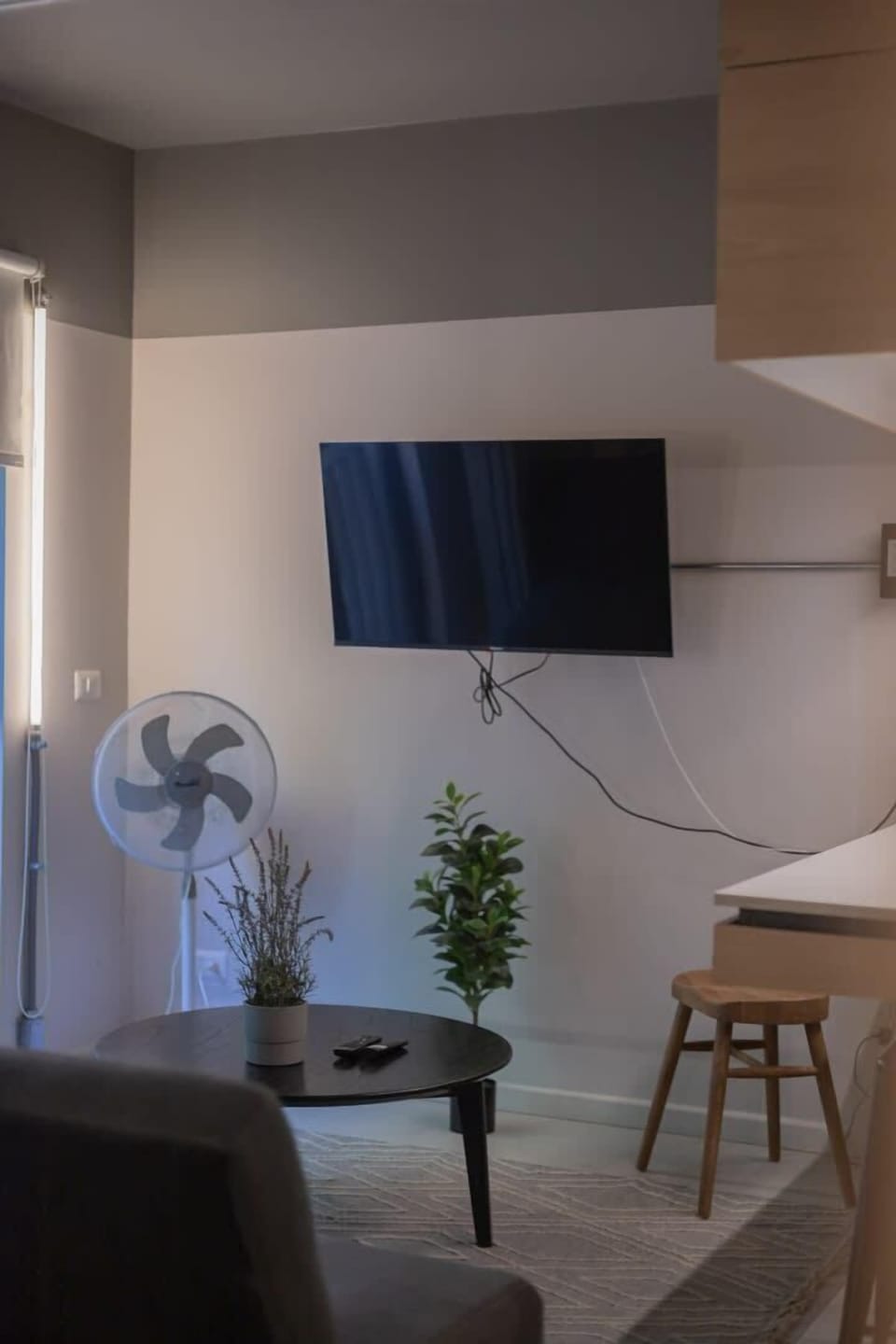 Cozy living area with modern amenities, perfect for relaxation and entertainment.