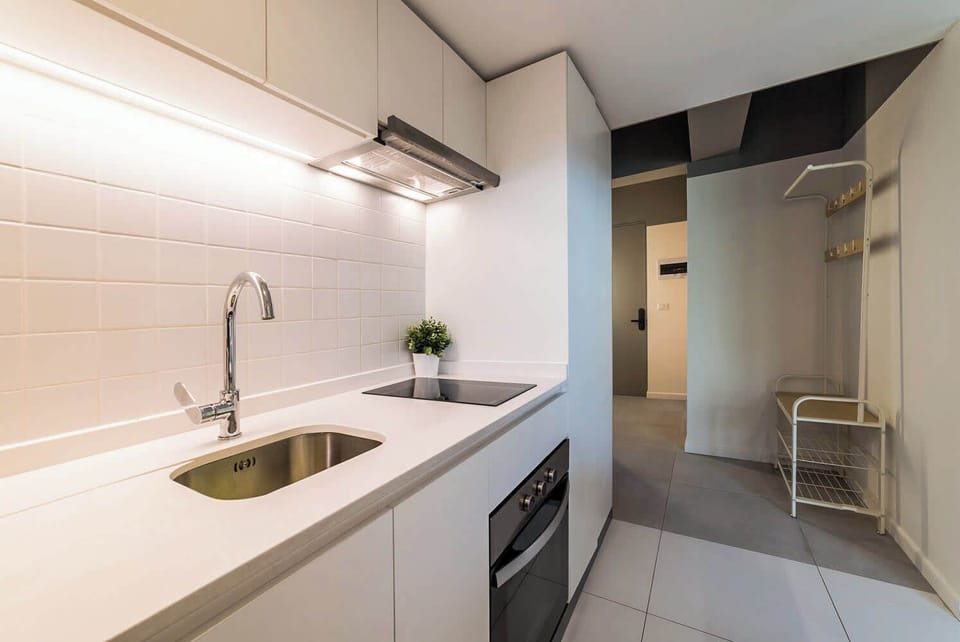 Sleek and modern kitchen with all essentials for a comfortable stay in the heart of Chile.