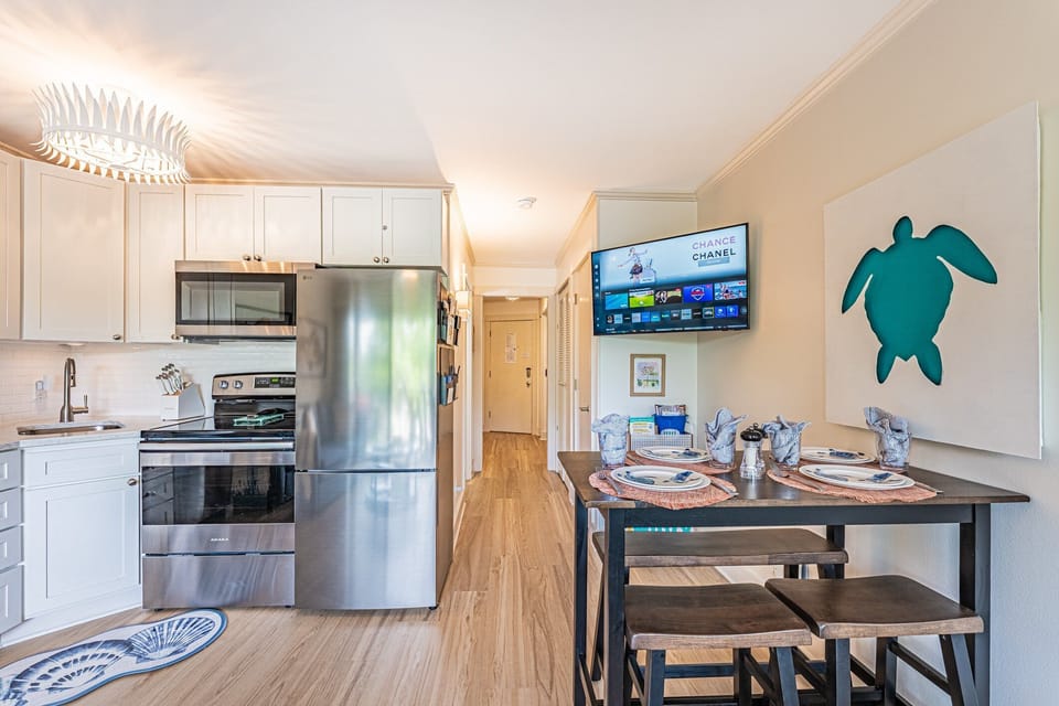 Enjoy beachside dining and modern amenities in this cozy coastal kitchen