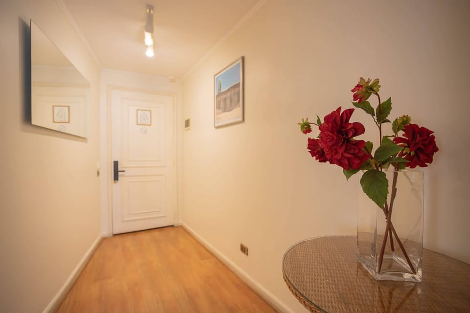 Welcome to your cozy retreat, featuring charming decor and a warm ambiance.