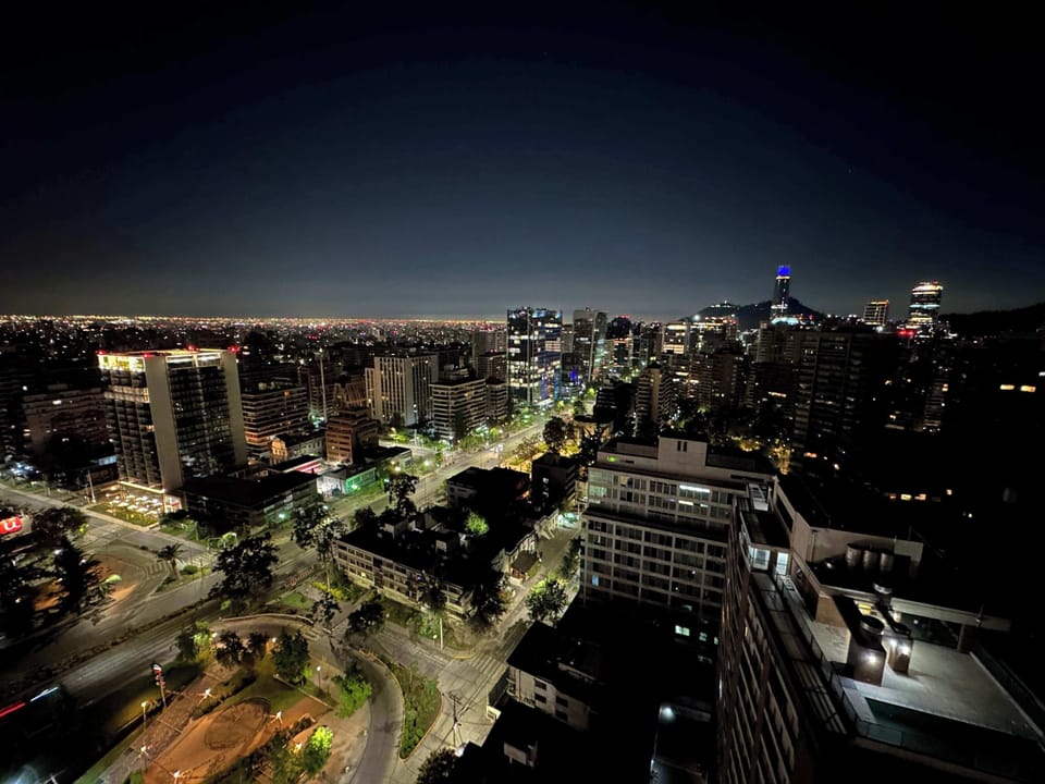 Experience breathtaking night views of the city skyline from your apartment, perfect for unwinding after a day of exploring.