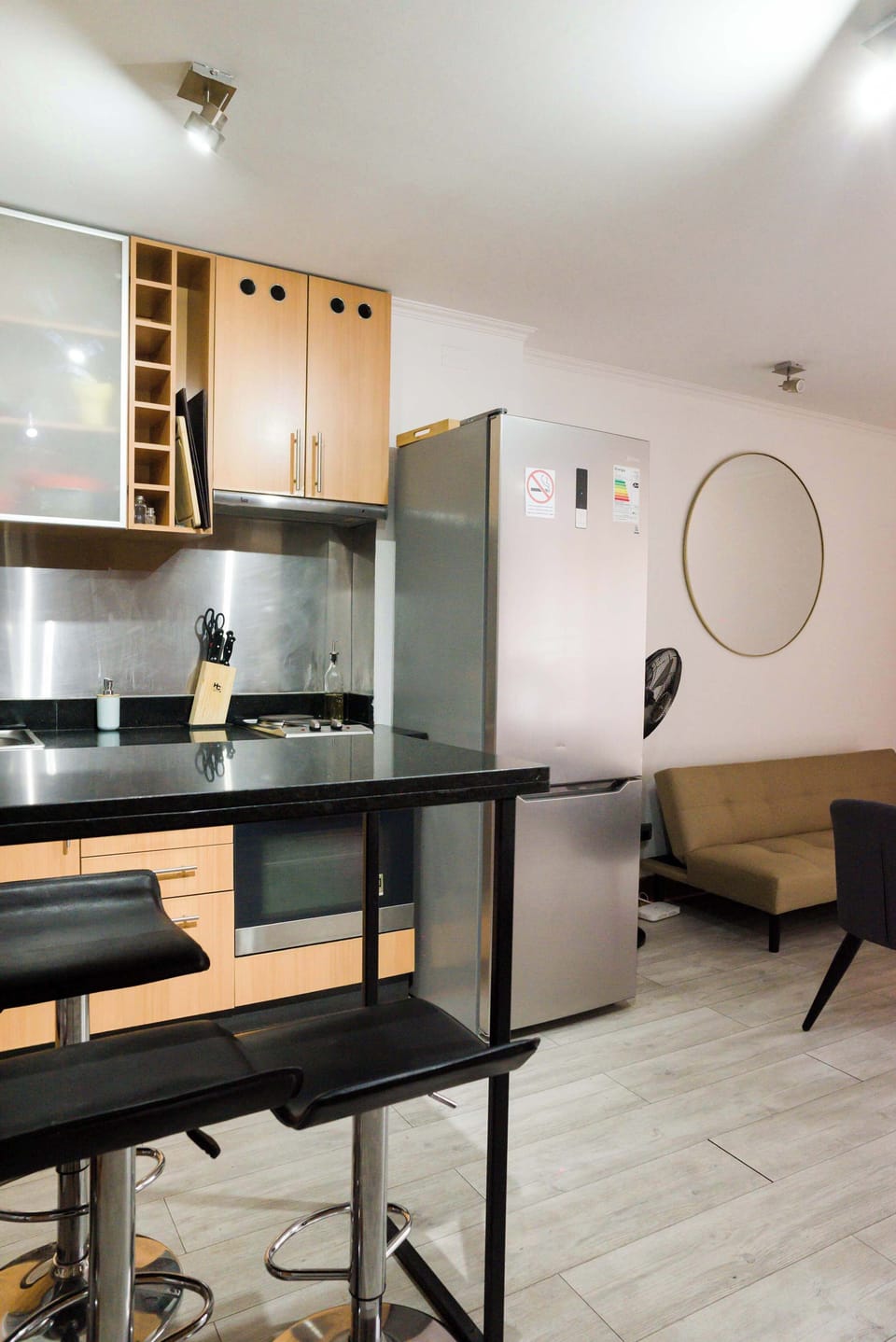 Sleek kitchen with modern amenities and a cozy seating area, perfect for relaxing after a day of exploring.
