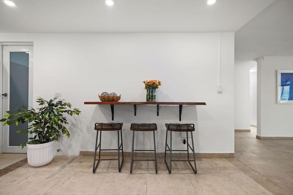 Three stools in the game area.