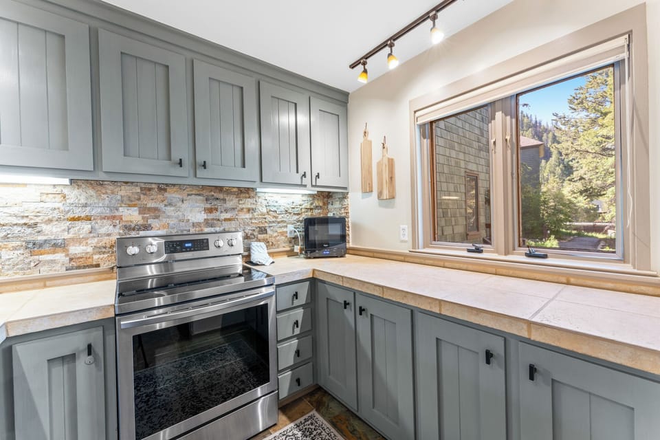 Kitchen with stainless steel appliances