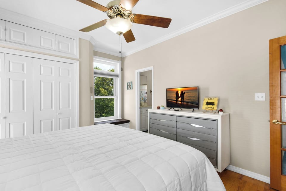 Guest bedroom with flat screen TV