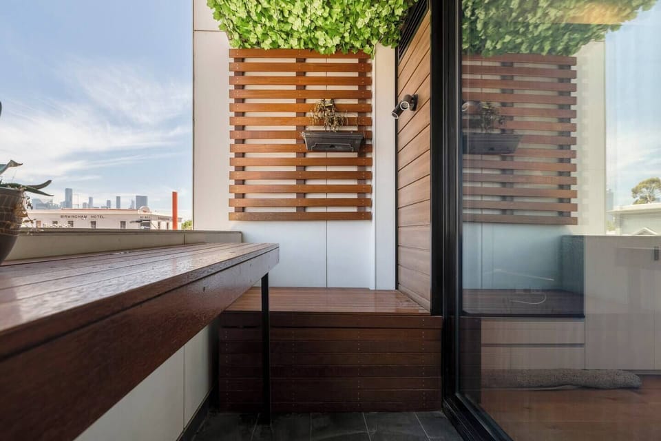 A private balcony offers the perfect spot to enjoy your morning coffee.