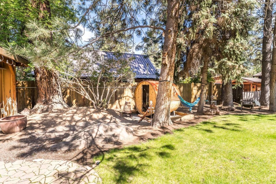 Unwind in the beautiful backyard where you’ll find ample grassy area & seating.