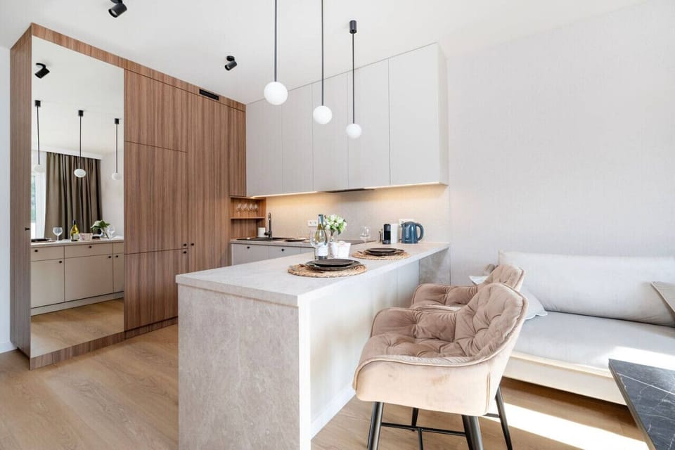 Comfortable Living Room with Sofa Bed and Smart TV | Book Now with RENTUJEMY