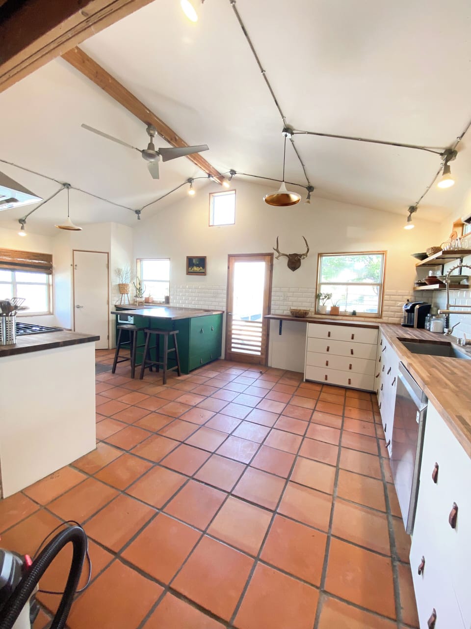 Spacious kitchen with gas range and dishwasher