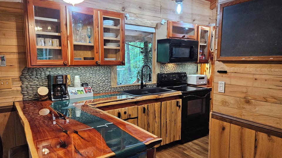 View of kitchen from living room seating area. 