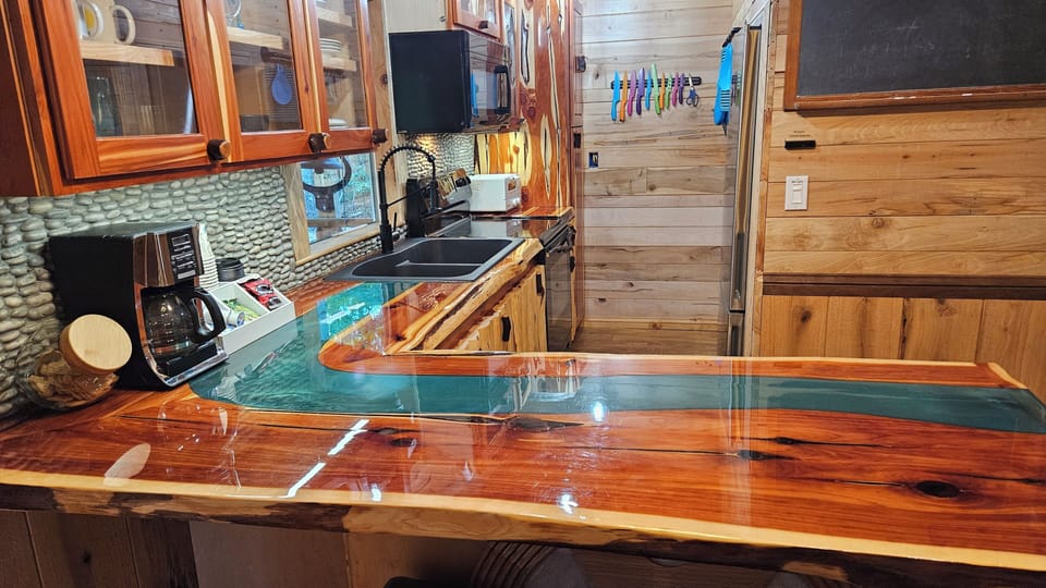 Kitchen fully stocked for a chef with plenty of cookware and dishware!