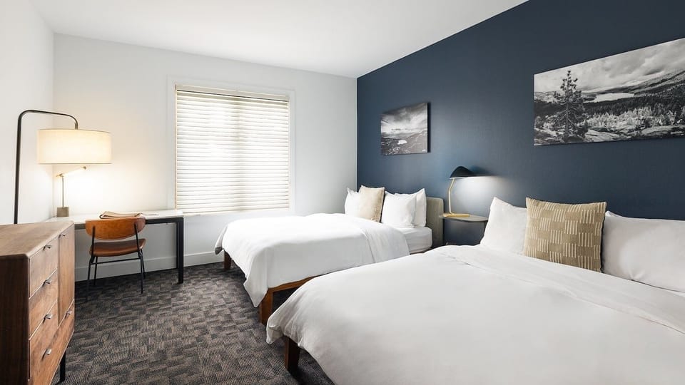Drift off easily with two plush beds and calming tones.