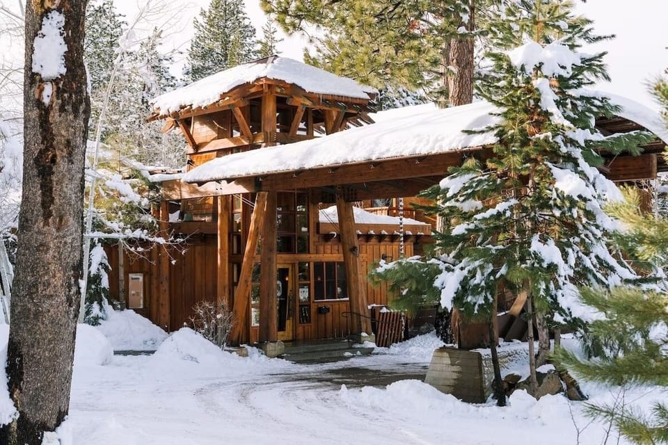 Arrive to a storybook lodge wrapped in fresh snow.