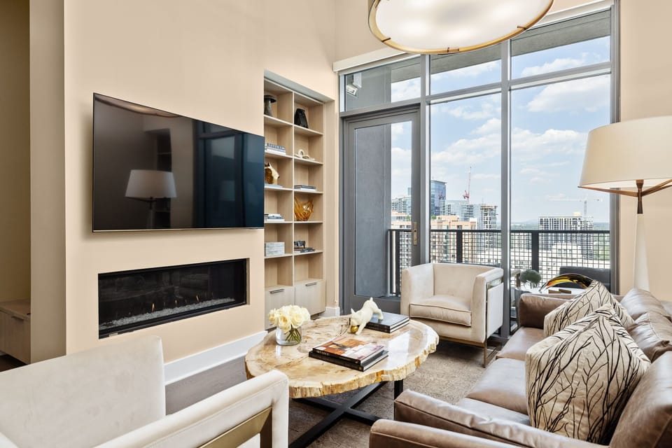 Living room featuring a 65" 4K UHD TV