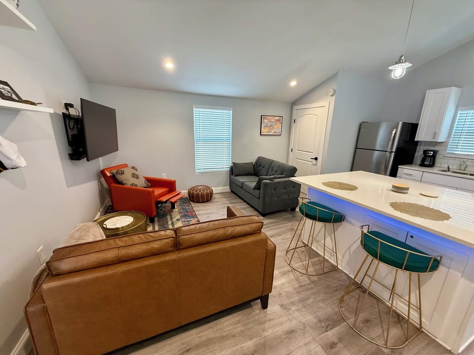 Good spot for game day or a family movie.  Rotate the red chair to add a seat.