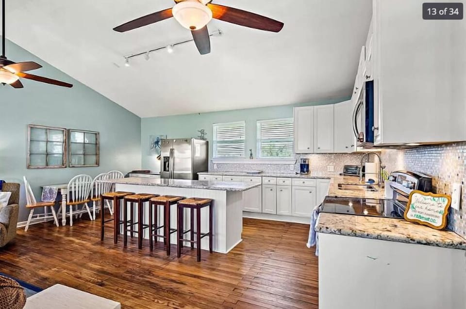 Kitchen, so many places to sit.