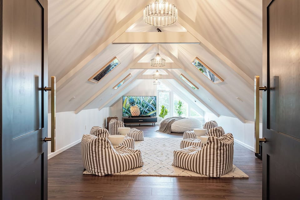 Media room in the attic space for cozy movie nights!