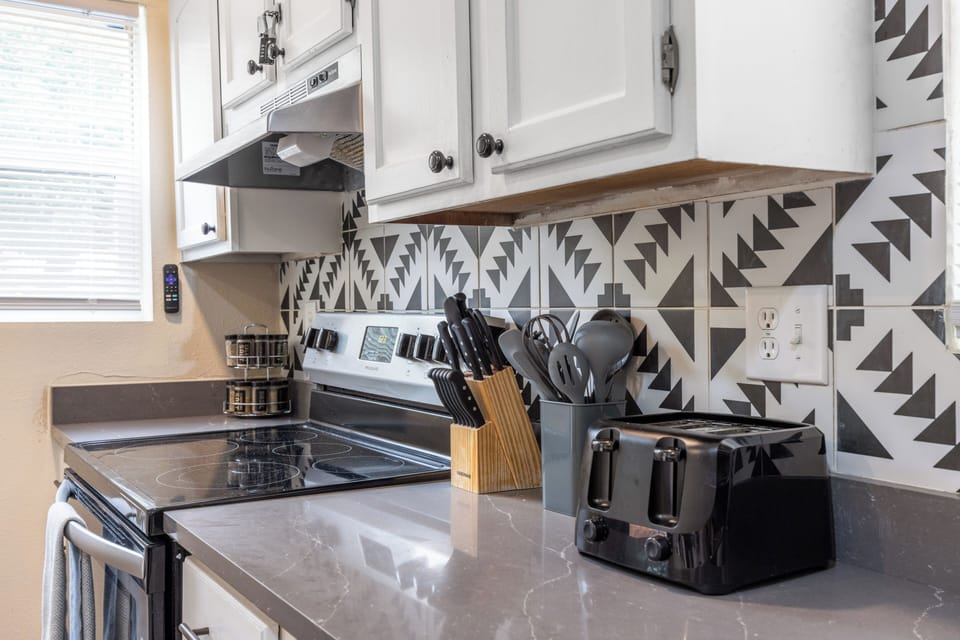 Kitchen with Knives, Kitchen utensils, spices & toaster