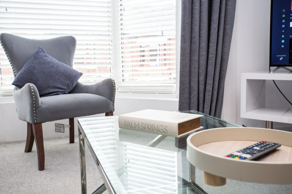 Decorative accents add charm and personality, making it an ideal spot for guests to unwind, read a book, or enjoy pleasant conversations during their stay.