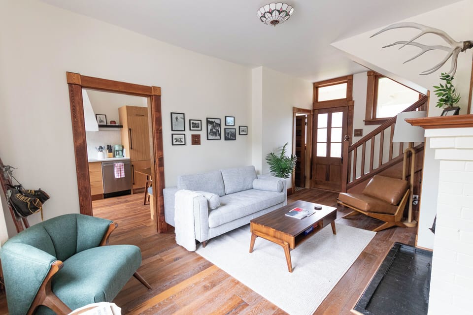 Unwind in a stylish living area that invites you to curl up with a good book beside the inviting sofa.