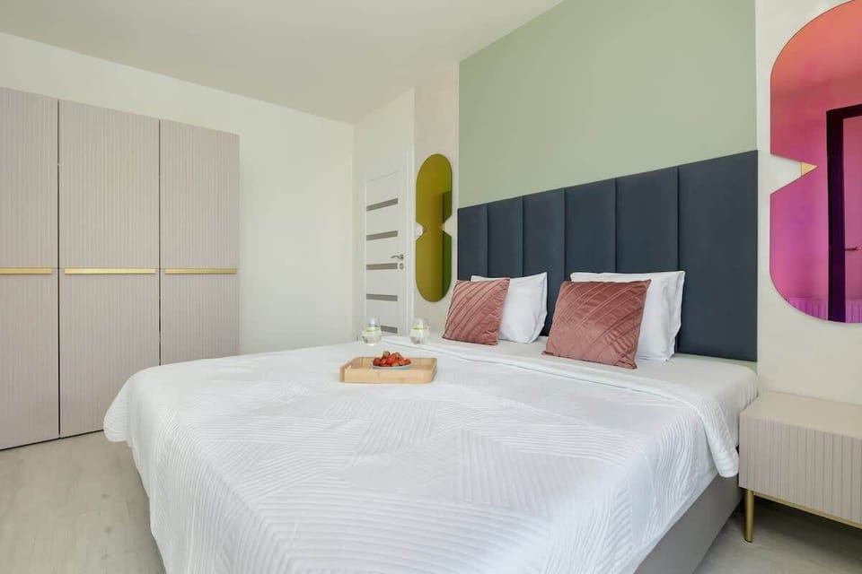 Bedroom with a double bed and wardrobe.