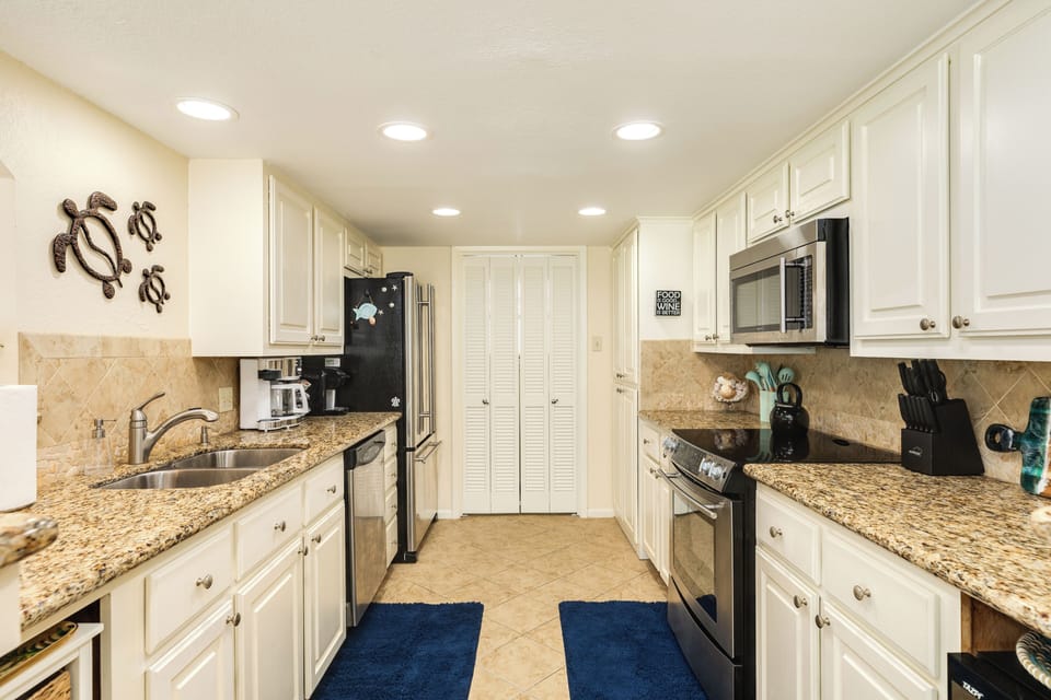Fully equipped kitchen with stainless steel appliances