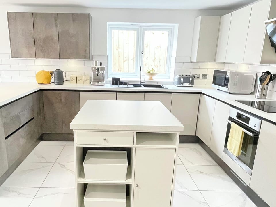 Kitchen; AEG Oven, Induction Hob and Glass Extractor, Large Inverter Microwave