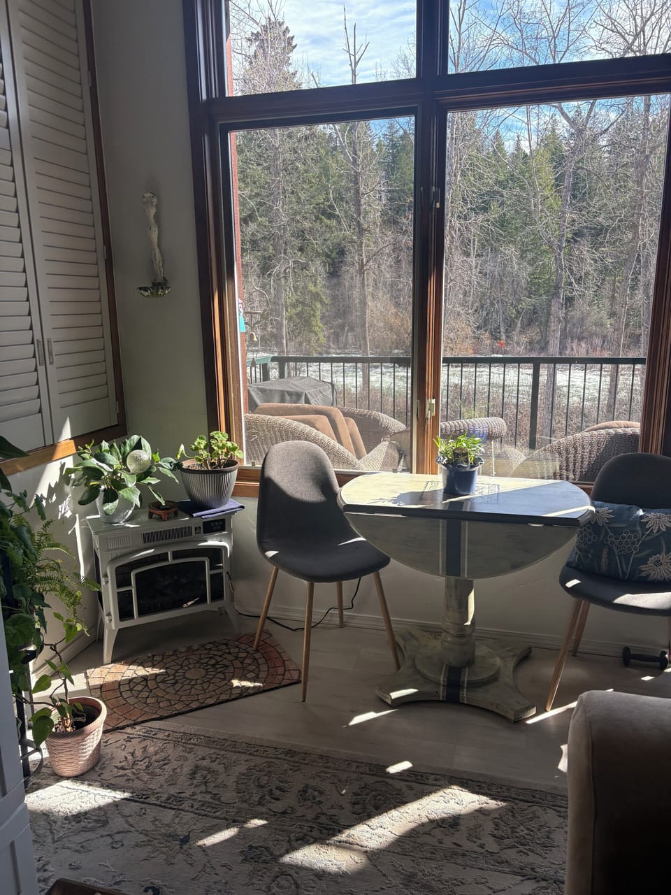 Kitchen table with river view, electric heater