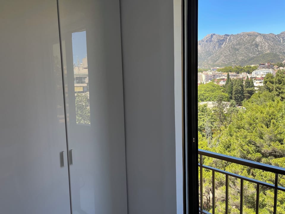 Main bedroom with wardrobes and view