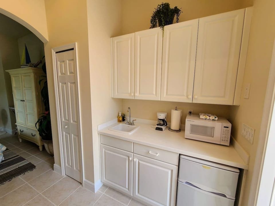 Your casita has a mini fridge, sink and microwave with storage space for dinner ware