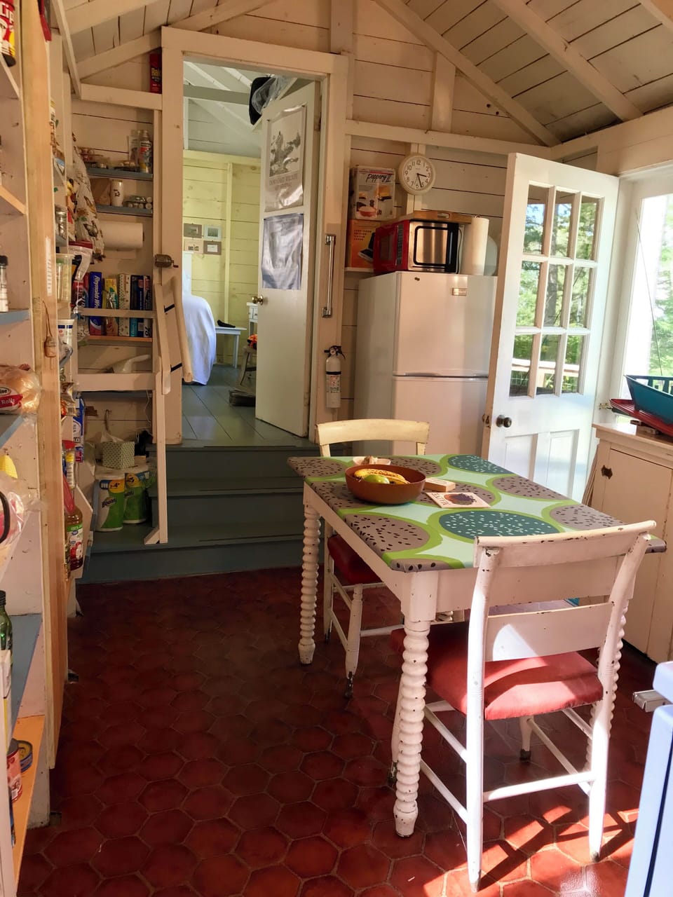 Kitchen view up to primary bedroom