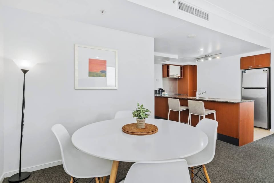 Enjoy a meal at home around the four-person dining table.