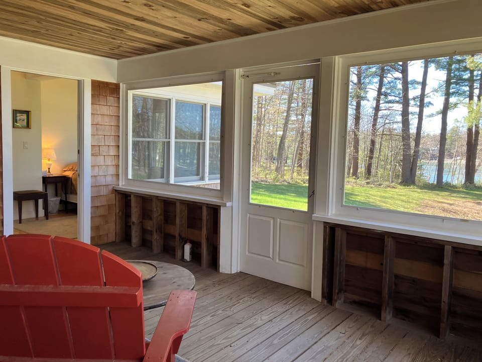 The screened porch has two access points from the house