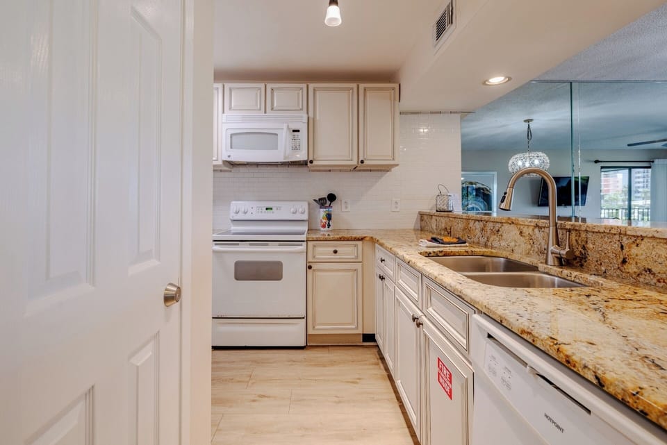 Kitchen opens to the Living Room area. 