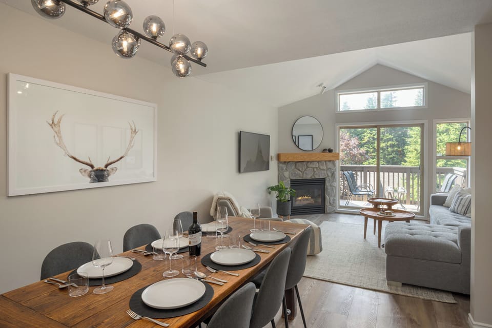 Living Room - with gas fireplace, smart TV for cable and streaming and access to your private patio with BBQ Grill