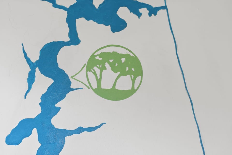 Custom artwork showcasing Three Oaks Manor’s connection to the iconic St. Johns River and the lush natural landscape surrounding the home.