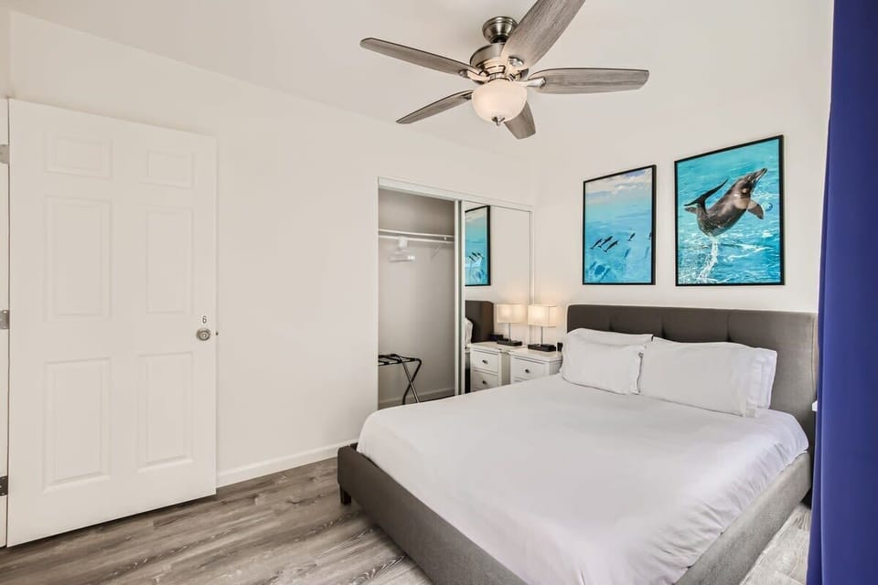 Bedroom 6 - Relax in this bedroom featuring a Queen bed, ceiling fan, blackout curtains, HDTV with streaming  network & cable channels from Youtube TV, and a spacious closet.