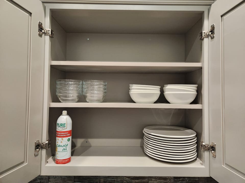 Kitchen cabinet with plates and bowls