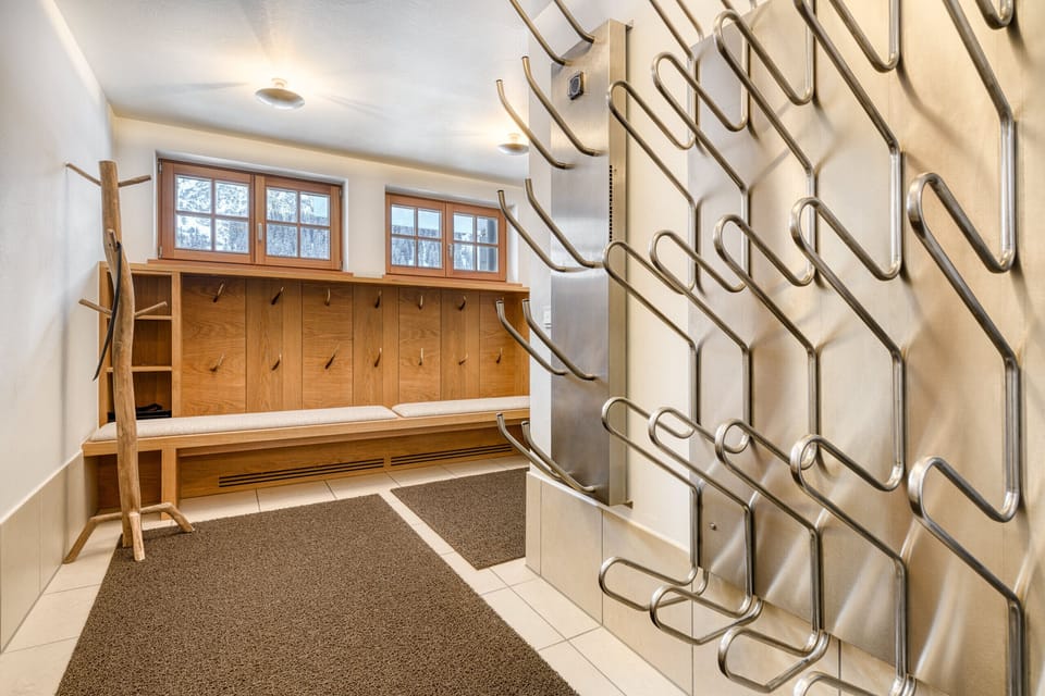 Ski room with ski boot warmer and changing room in Chalet Lilly - Luxury in Lech am Arlberg.