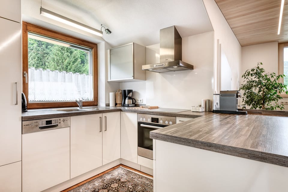 Kitchen in the Deluxe Alpine Holiday Apartment in Bürs in the Brandnertal valley.
