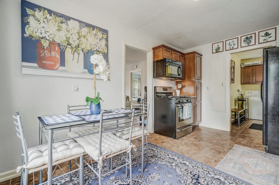 Fully stocked kitchen with seating for four