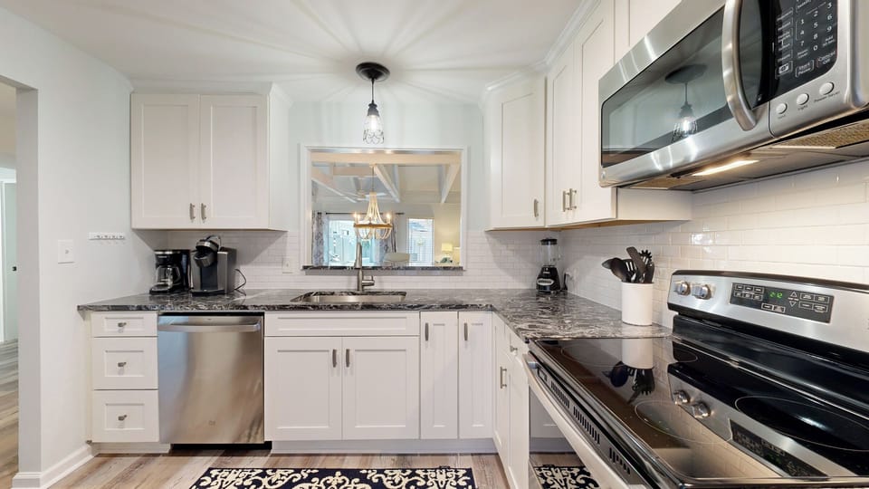Fully Stocked Kitchen with Pass-Through Window