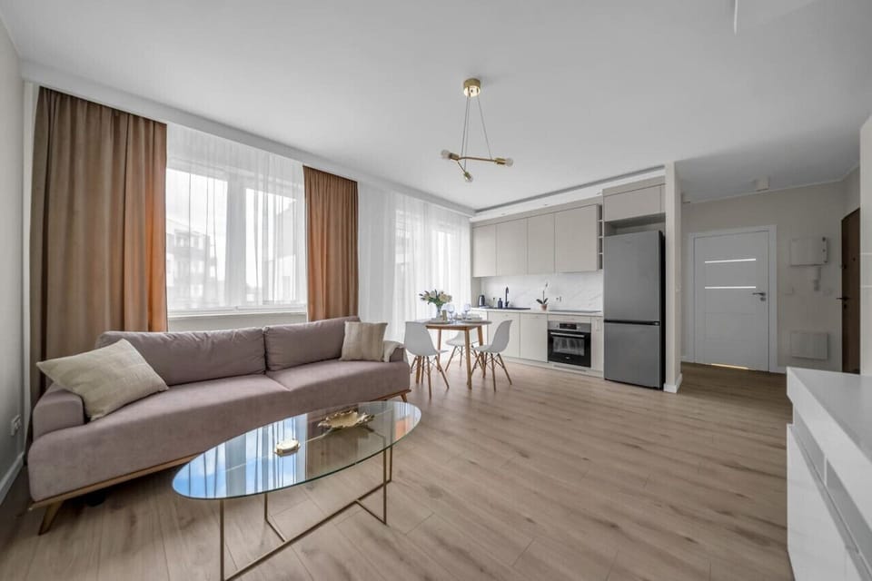Comfortable Living Room with Sofa Bed and Smart TV | Book Now with RENTUJEMY