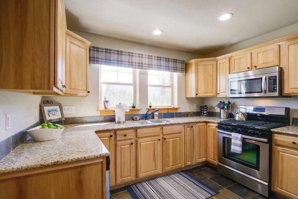 Fully stocked kitchen with gas stove
