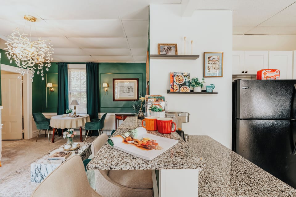 An inviting open kitchen and dining area designed for comfort and conversation.